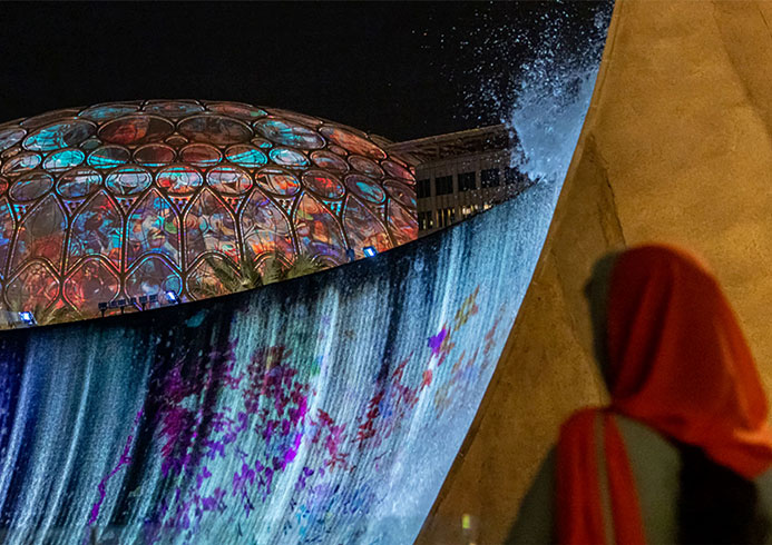 Visitors soak up the magic of Surreal at night as 21 Christie Crimson laser projectors paint the water in vibrant colors, making it look almost phosphorescent. Watch now!