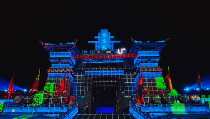 Jianye Display’s team performing projection calibration on the façade of the citadel