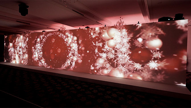 Projection mapping on a massive wall measuring 24 meters (79 feet) wide and 3 meters (10 feet) high.