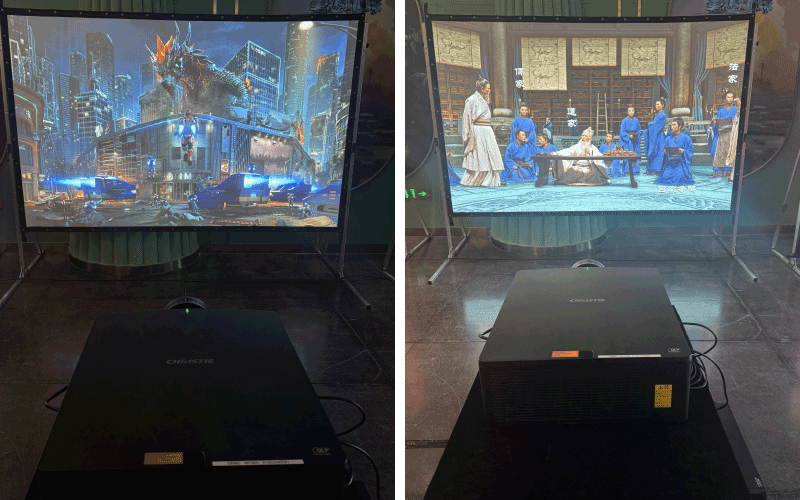 A 1DLP projector illuminates a projection screen.